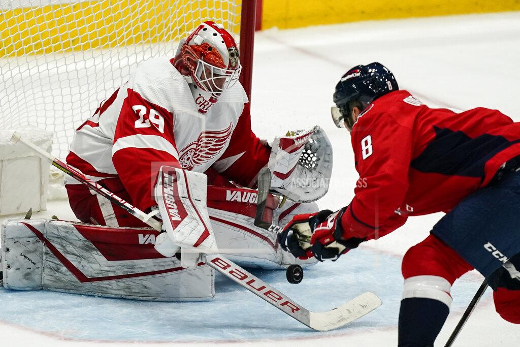 Alex Brandon Detroit Red Wings goaltender Thomas Greiss (29) blocks a shot by Washington Capitals left wing Alex Ovechkin (8) in the third period of an NHL hockey game, Wednesday, Oct. 27, 2021, in Washington. The Red Wings won 3-2 in overtime. (AP Photo/Alex Brandon)