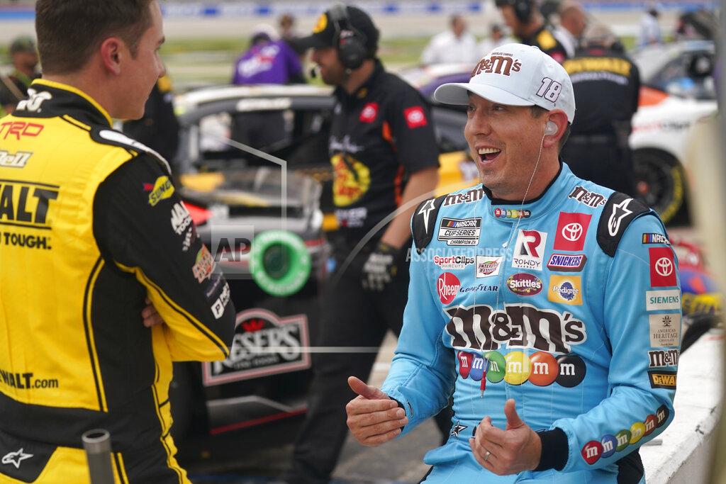 Lm Otero Kyle Busch, right, and and Christopher Bell chat on the track during qualifying for the NASCAR All-Star auto race at Texas Motor Speedway in Fort Worth, Texas, Saturday, May 21, 2022. (AP Photo/LM Otero)