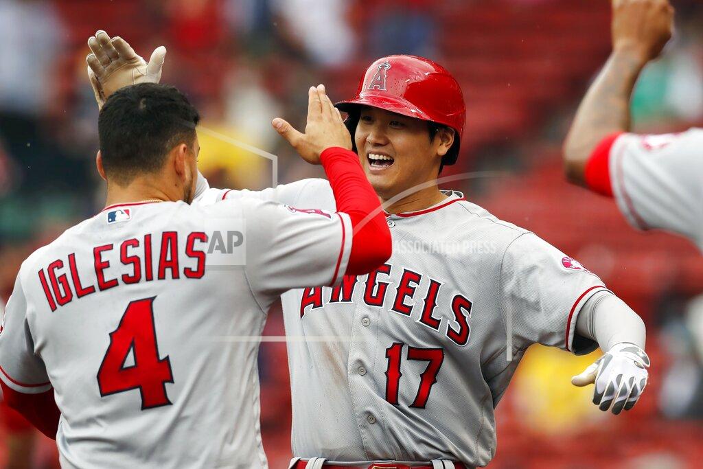 Michael Dwyer Los Angeles Angels' Shohei Ohtani (17) celebrates his two-run home run with teammate Jose Iglesias (4) during the ninth inning of a baseball game against the Boston Red Sox, Sunday, May 16, 2021, in Boston. (AP Photo/Michael Dwyer)