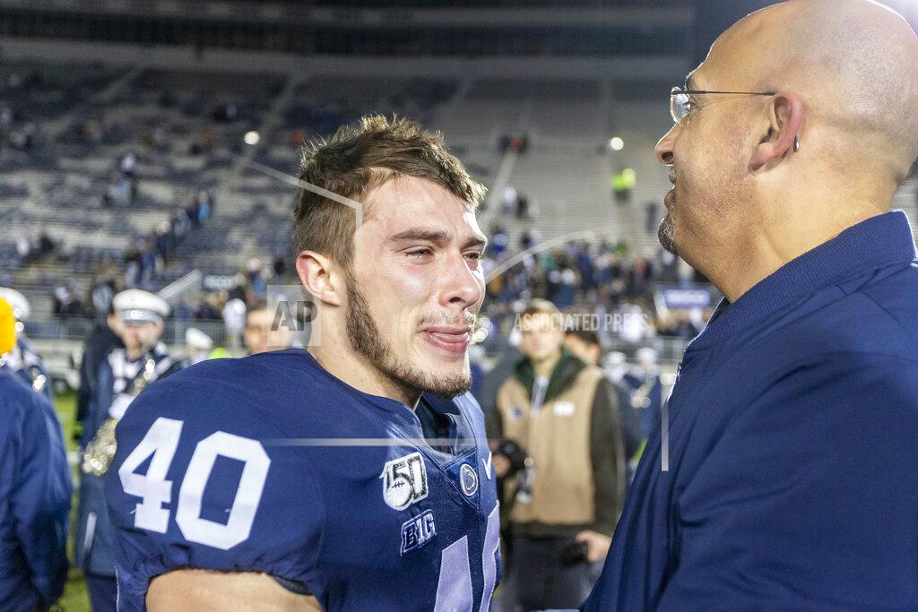Joe Hermitt Penn State running back Nick Eury sheds a tear as he hugs head coach James Franklin after the 27-6 win over Rutgers on Senior Day on Nov. 30, 2019. (Joe Hermitt/The Patriot-News via AP)