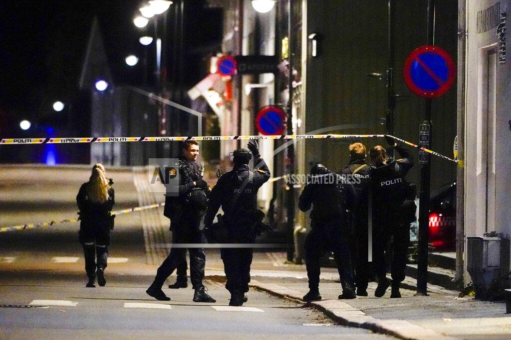 Hakon Mosvold Larsen Police stand at the scene after an attack in Kongsberg, Norway, Wednesday, Oct. 13, 2021. Several people have been killed and others injured by a man armed with a bow and arrow in a town west of the Norwegian capital, Oslo. (Hakon Mosvold Larsen/NTB Scanpix via AP)