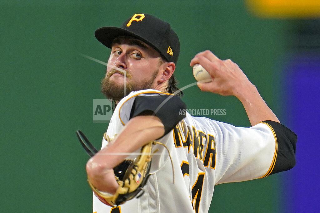 Gene J. Puskar Pittsburgh Pirates starting pitcher JT Brubaker delivers during the third inning of the team's baseball game against the Los Angeles Dodgers in Pittsburgh, Tuesday, June 8, 2021. (AP Photo/Gene J. Puskar)