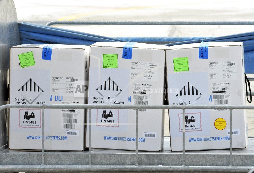 Kemal Softic Boxes of the Pfizer vaccine are unloaded at the Sarajevo Airport, in Bosnia, Thursday, March 25, 2021. A plane carrying 24.000 Pfizer vaccines, part of the international COVAX initiative to ensure vaccine access for low- and middle-income countries, delivered the first COVAX vaccines to Bosnia. (AP Photo/Kemal Softic)