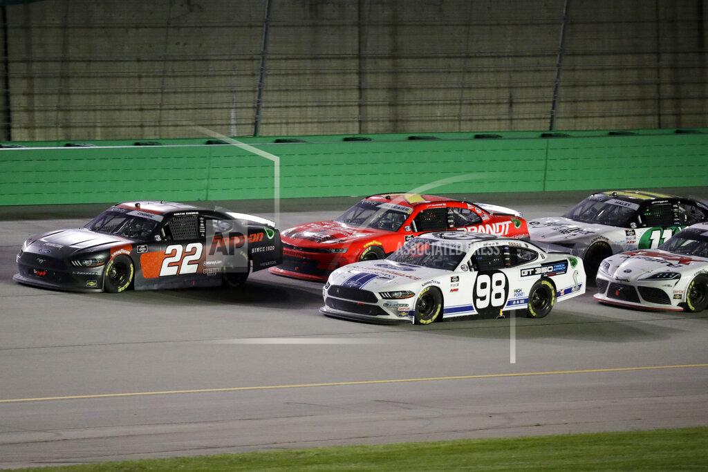 Mark Humphrey Austin Cindric (22) heads to the finish ahead of Chase Briscoe (98) during a NASCAR Xfinity Series auto race Thursday, July 9, 2020, in Sparta, Ky. (AP Photo/Mark Humphrey)