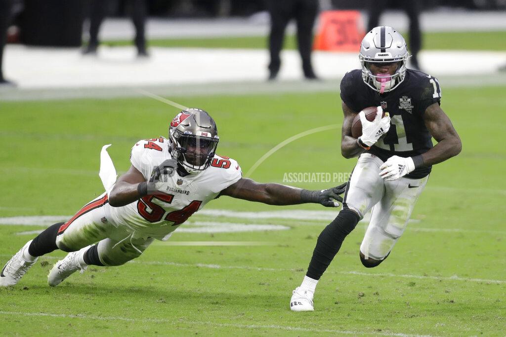 Isaac Brekken Las Vegas Raiders wide receiver Henry Ruggs III (11) runs by Tampa Bay Buccaneers inside linebacker Lavonte David (54) during the second half of an NFL football game, Sunday, Oct. 25, 2020, in Las Vegas. (AP Photo/Isaac Brekken)