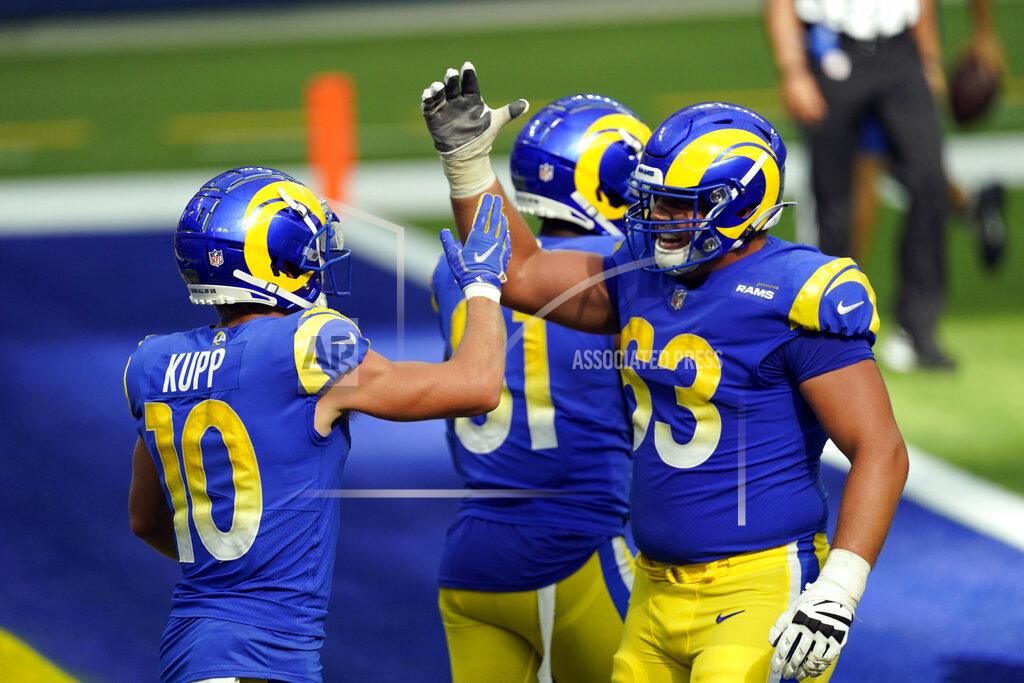 Ashley Landis Los Angeles Rams wide receiver Cooper Kupp (10) celebrates his touchdown catch with Austin Corbett (63) during the second half of an NFL football game against the New York Giants Sunday, Oct. 4, 2020, in Inglewood, Calif. (AP Photo/Ashley Landis)