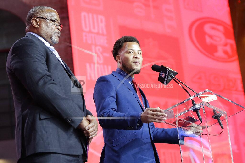 Mark Humphrey DeMarcus Cobb, son of former NFL player and scout Reggie Cobb, announces the pick by the San Francisco 49ers of South Carolina wide reciever Deebo Samuel during the the second round of the NFL football draft, Friday, April 26, 2019, in Nashville, Tenn. (AP Photo/Mark Humphrey)
