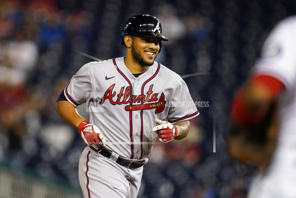 Alex Brandon Atlanta Braves' Huascar Ynoa smiles as he runs the bases for his grand slam during the sixth inning of baseball game against the Washington Nationals at Nationals Park, Tuesday, May 4, 2021, in Washington. (AP Photo/Alex Brandon)