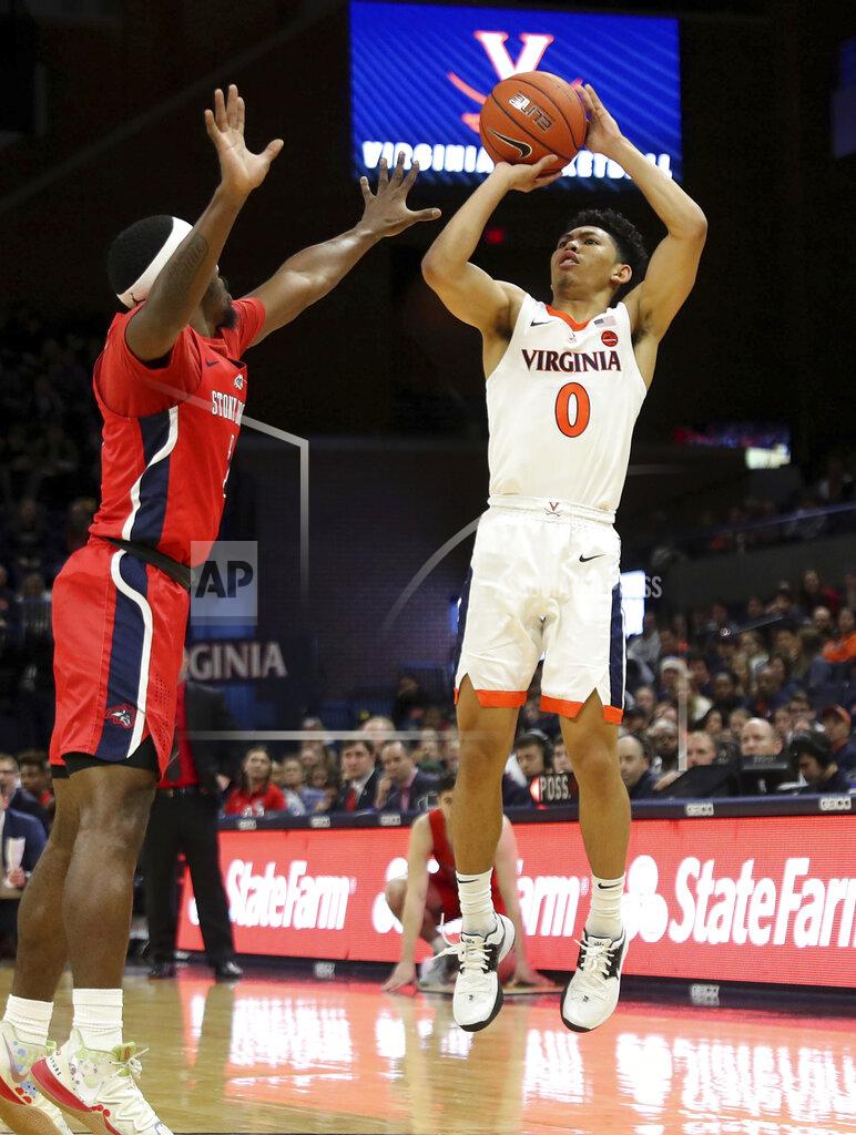Andrew Shurtleff Virginia guard Kihei Clark (0) shoots over Stony Brook guard Makale Foreman (1) during an NCAA college basketball game in Charlottesville, Va., Wednesday, Dec. 18, 2019. Virginia won 56-44. (AP Photo/Andrew Shurtleff)