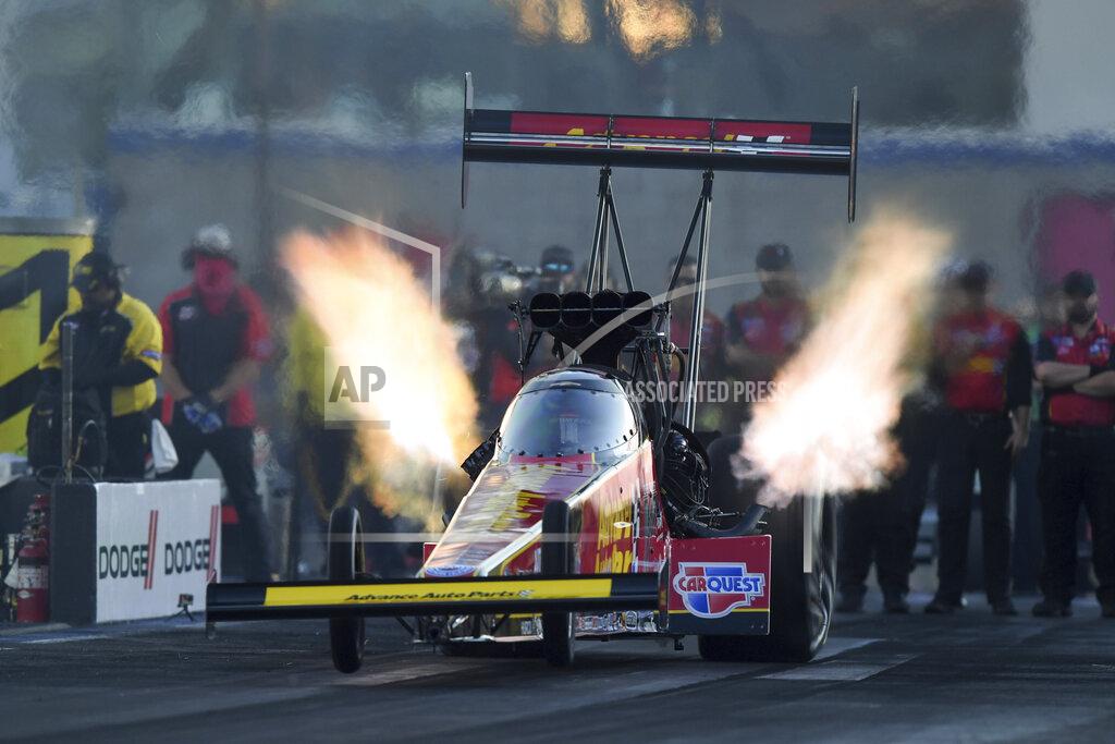 Marc Gewertz In this photo provided by the NHRA, Brittany Force drives in Top Fuel qualifying Friday, Nov. 1, 2019, at the Dodge NHRA Nationals drag races in Las Vegas. Force had a pass at 3.659 seconds at 338.17 mph. (Marc Gewertz/NHRA via AP)
