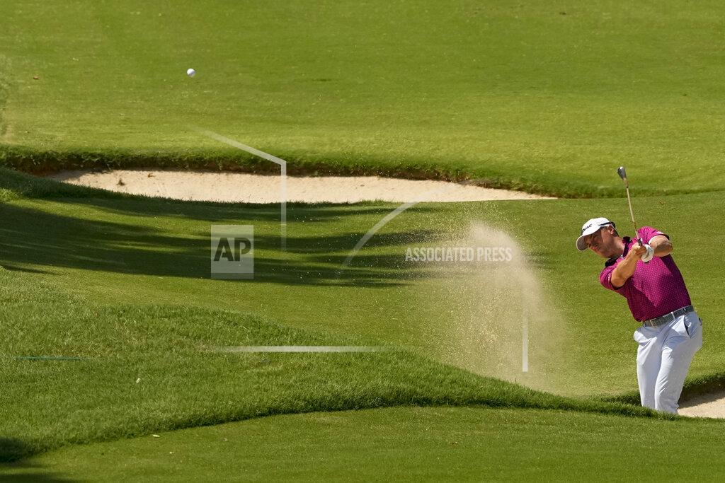Matt York Justin Thomas hits from the bunker on the ninth hole during the first round of the PGA Championship golf tournament at Southern Hills Country Club, Thursday, May 19, 2022, in Tulsa, Okla. (AP Photo/Matt York)