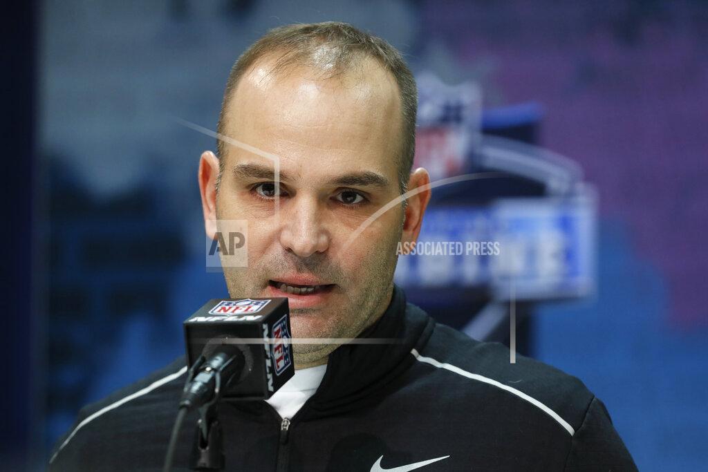 FILE - In this Feb. 25, 2020, file photo, Jacksonville Jaguars general manager David Caldwell speaks during a press conference at the NFL football scouting combine in Indianapolis. General managers around the league ran their drafts virtually without a hitch last month, thanks largely to the work and ingenuity of their information technology staffs. Tech support remains a vital role in the NFL offseason as long as team facilities are closed, with coaches and officials needing to connect with players scattered about the country.(AP Photo/Charlie Neibergall, File)