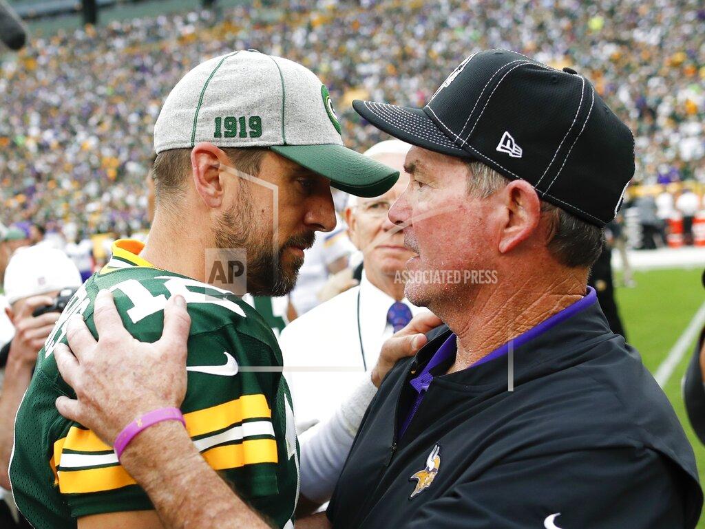 Matt Ludtke Minnesota Vikings head coach Mike Zimmer talks to Green Bay Packers' Aaron Rodgers after an NFL football game Sunday, Sept. 15, 2019, in Green Bay, Wis. The Packers won 21-16. (AP Photo/Matt Ludtke)