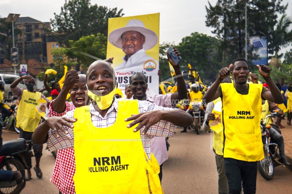 Jerome Delay Supporters of Ugandan President Yoweri Kaguta Museveni celebrate in Kampala, Uganda, Saturday Jan. 16, 2021, after their candidate was declared winner of the presidential elections. Uganda’s electoral commission says longtime President Yoweri Museveni has won a sixth term, while top opposition challenger Bobi Wine alleges rigging and officials struggle to explain how polling results were compiled amid an internet blackout. In a generational clash widely watched across the African continent, the young singer-turned-lawmaker Wine posed arguably the greatest challenge yet to Museveni. (AP Photo/Jerome Delay)