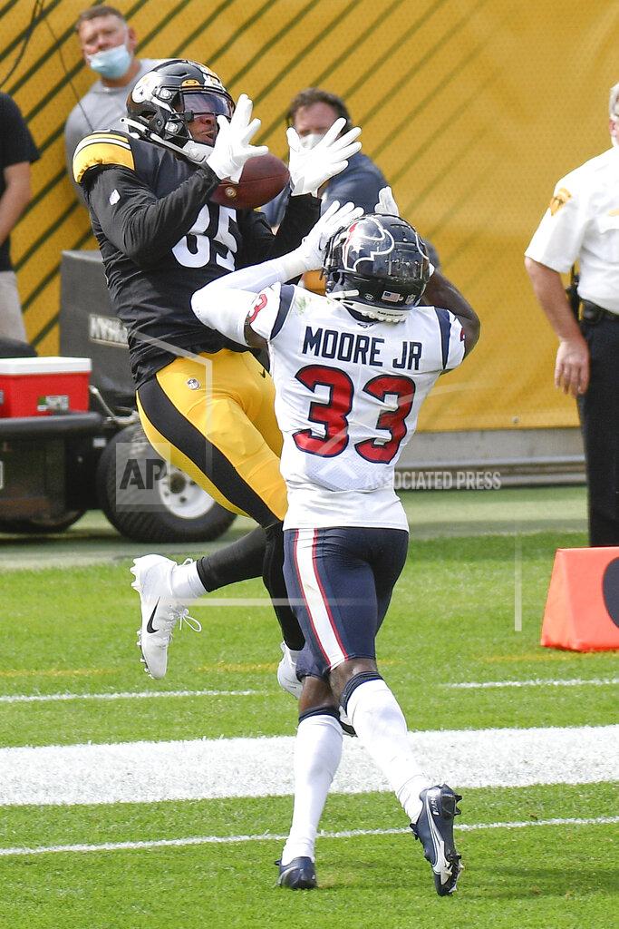 Don Wright Pittsburgh Steelers tight end Eric Ebron (85) makes a touchdown catch behind Houston Texans safety A.J. Moore (33) in the first half of an NFL football game, Sunday, Sept. 27, 2020, in Pittsburgh. (AP Photo/Don Wright)