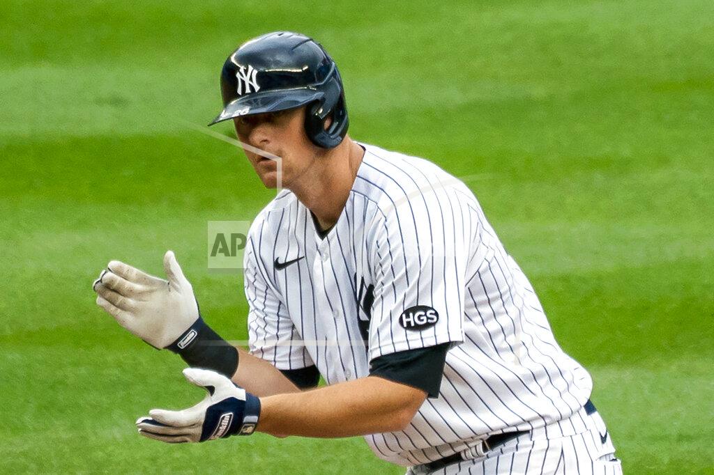 Corey Sipkin FILE - New York Yankees' DJ LeMahieu celebrates at second base after hitting a two-run double during the sixth inning of a baseball game against the Miami Marlins at Yankee Stadium in New York, in this Saturday, Sept. 26, 2020, file photo. The New York Yankees and AL batting champion DJ LeMahieu worked Friday, Jan. 15, 2021, to put in place a six-year contract worth about $90 million, a person familiar with the deal told The Associated Press. The person spoke on condition of anonymity because the agreement is subject to a successful physical. (AP Photo/Corey Sipkin, File)