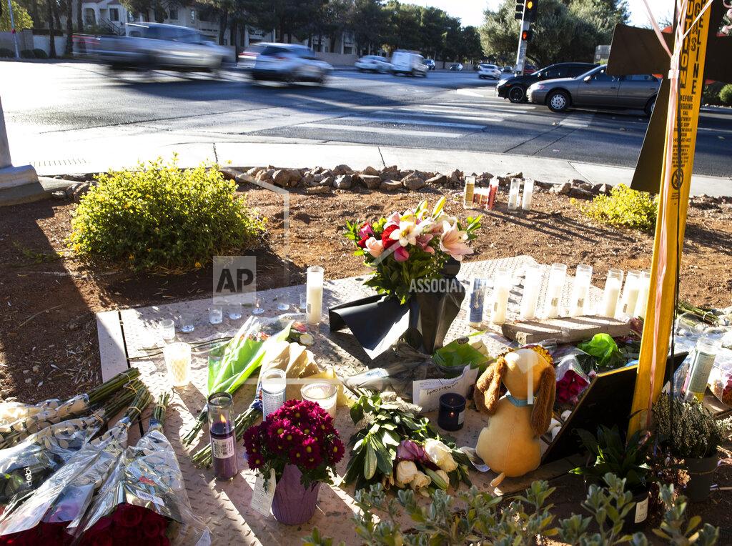 Bizuayehu Tesfaye A makeshift memorial to honor Tina Tintor, 23, is seen at South Rainbow Boulevard and Spring Valley Parkway, on Thursday, Nov. 4, 2021, in Las Vegas. Tintor and her dog were killed when former Raiders wide receiver Henry Ruggs, accused of DUI, slammed into the rear of Tintor's vehicle. (Bizuayehu Tesfaye/Las Vegas Review-Journal)