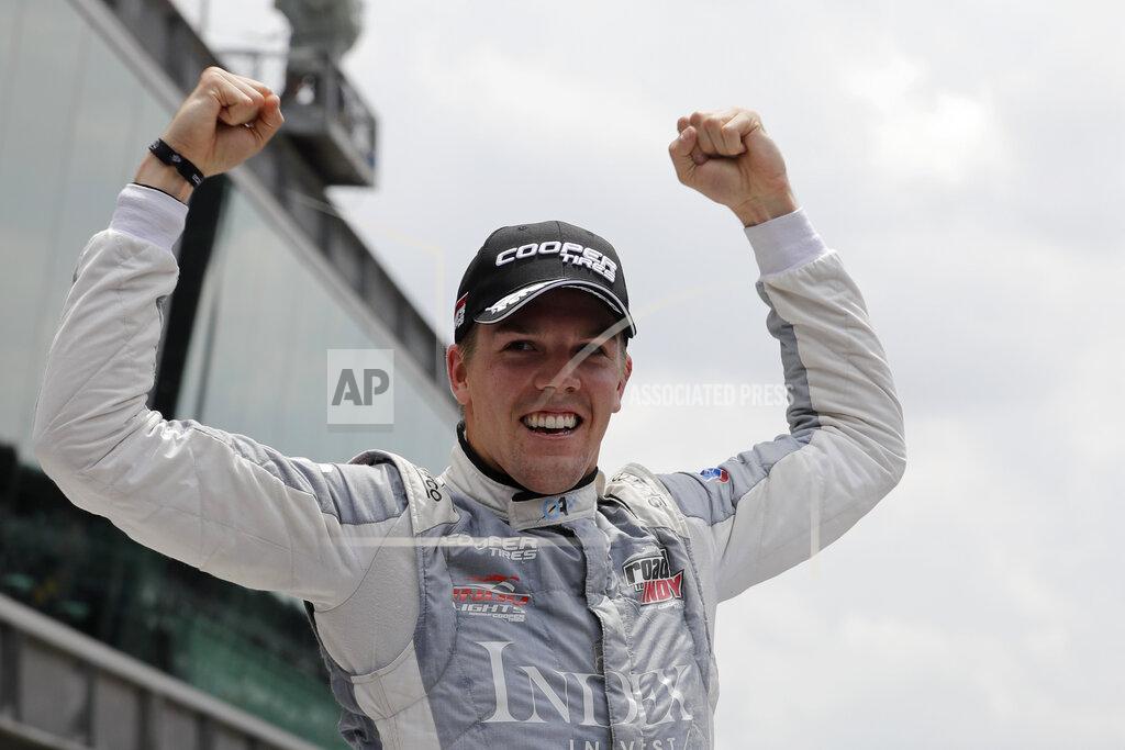 Darron Cummings Oliver Askew celebrates winning the Indy Lights Freedom 100 IndyCar auto race at Indianapolis Motor Speedway, Friday, May 24, 2019, in Indianapolis. (AP Photo/Darron Cummings)