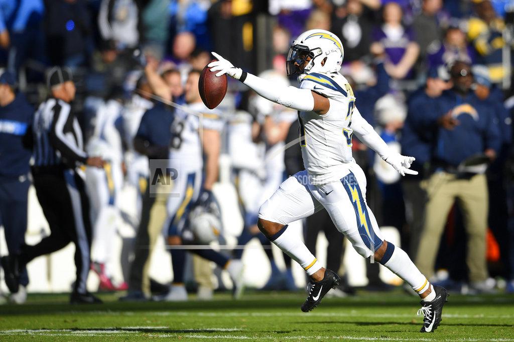 Nick Wass Los Angeles Chargers defensive back Adrian Phillips celebrates after intercepting a pass attempt in the first half of an NFL wild card playoff football game against the Baltimore Ravens, Sunday, Jan. 6, 2019, in Baltimore. (AP Photo/Nick Wass)