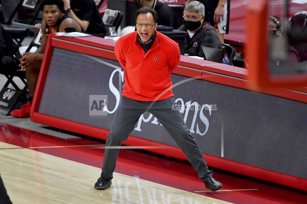 Michael Woods Georgia coach Tom Crean talks to his team as they play Arkansas during the second half of an NCAA college basketball game Saturday, Jan. 9, 2021, in Fayetteville, Ark. (AP Photo/Michael Woods)