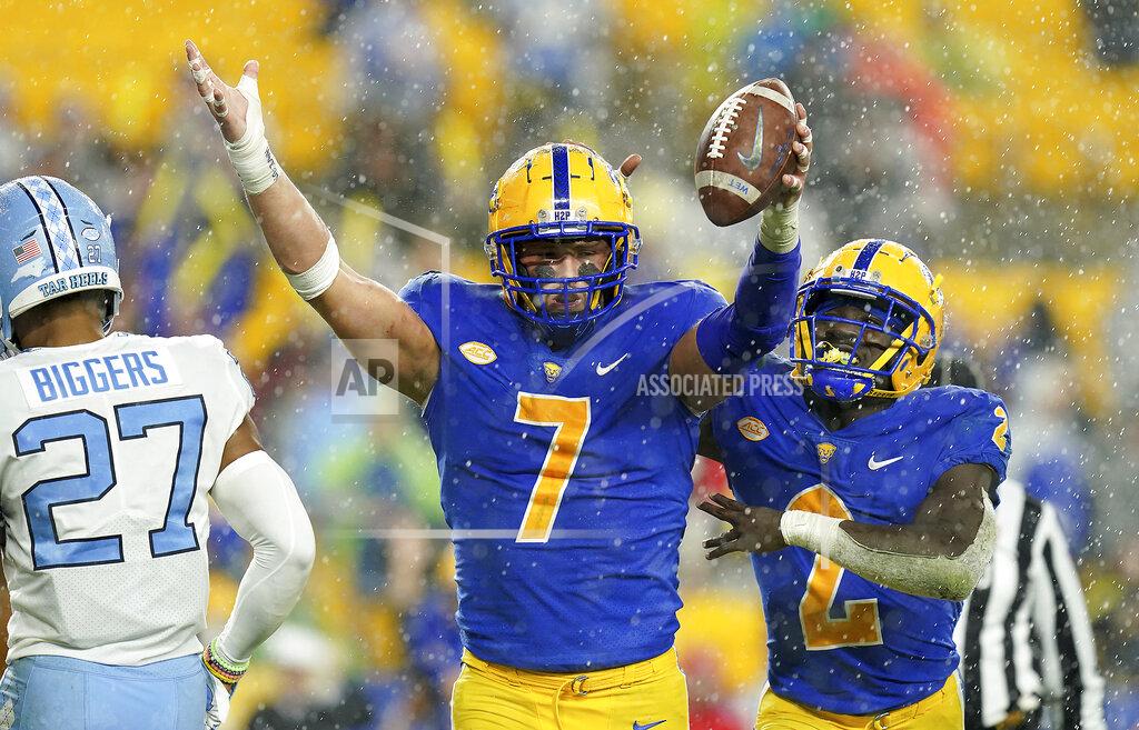 Matt Freed Pittsburgh tight end Lucas Krull celebrates after pulling in a pass for a touchdown against North Carolina in overtime during an NCAA college football game Thursday, Nov. 11, 2021, in Pittsburgh. (Matt Freed/Pittsburgh Post-Gazette via AP)