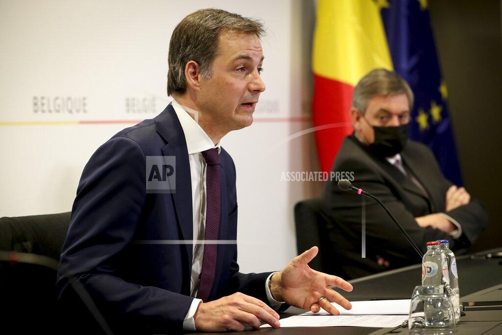 Benoit Doppagne Belgium's Prime Minister Alexander De Croo speaks during a media conference after a meeting of the consultative committee of government ministers in Brussels, Wednesday, March 24, 2021. Ministers met on Wednesday to discuss a possible tightening of COVID-19 measures as infections are once again on the rise. (Benoit Doppagne, Pool via AP)