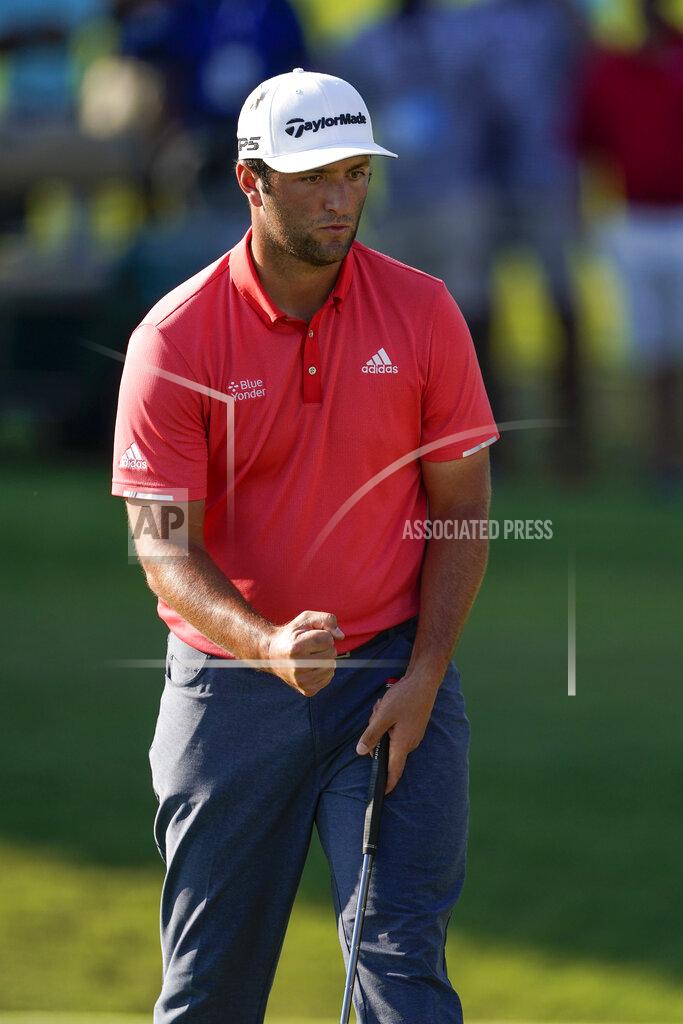 John Bazemore Jon Rahm reacts after making a putt for birdie on the 18th hole during the final round of the Tour Championship golf tournament at East Lake Golf Club in Atlanta, Monday, Sept. 7, 2020. (AP Photo/John Bazemore)