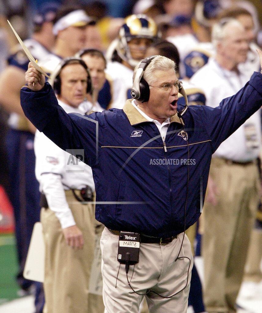 Kathy Willens FILE - In this Feb. 3, 2002, file photo, St. Louis Rams coach Mike Martz yells at the referees in the first quarter of NFL football's Super Bowl XXXVI against the New England Patriots in New Orleans. The Rams had to settle for a field goal on the drive. The Rams moved from St. Louis to Los Angeles, had seven head coaches and used 20 starting quarterbacks since losing to the New England Patriots in the Super Bowl 17 years ago. (AP Photo/Kathy Willens, File)