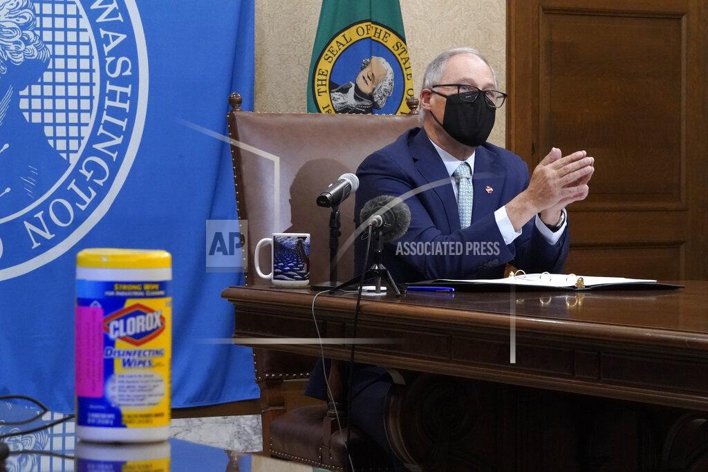 Ted S. Warren Washington Gov. Jay Inslee speaks at a news conference, Tuesday, Jan. 5, 2021, at the Capitol in Olympia, Wash. Inslee said some COVID-19 restrictions in Washington will be eased beginning next week and the state will change its reopening plan to move from a county-based oversight system to one focused on regions. (AP Photo/Ted S. Warren)