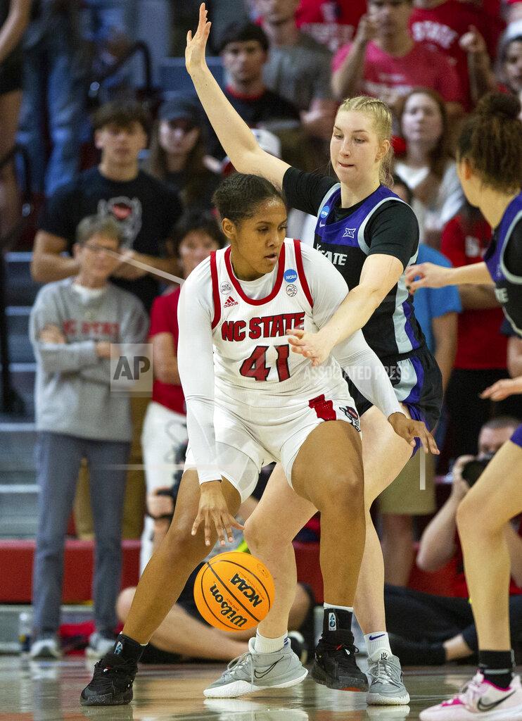 Ben Mckeown North Carolina State's Camille Hobby (41) handles the ball as Kansas State's Taylor Lauterbach defends during the second half of a college basketball game in the second round of the NCAA tournament in Raleigh, N.C., Monday, March 21, 2022. (AP Photo/Ben McKeown)