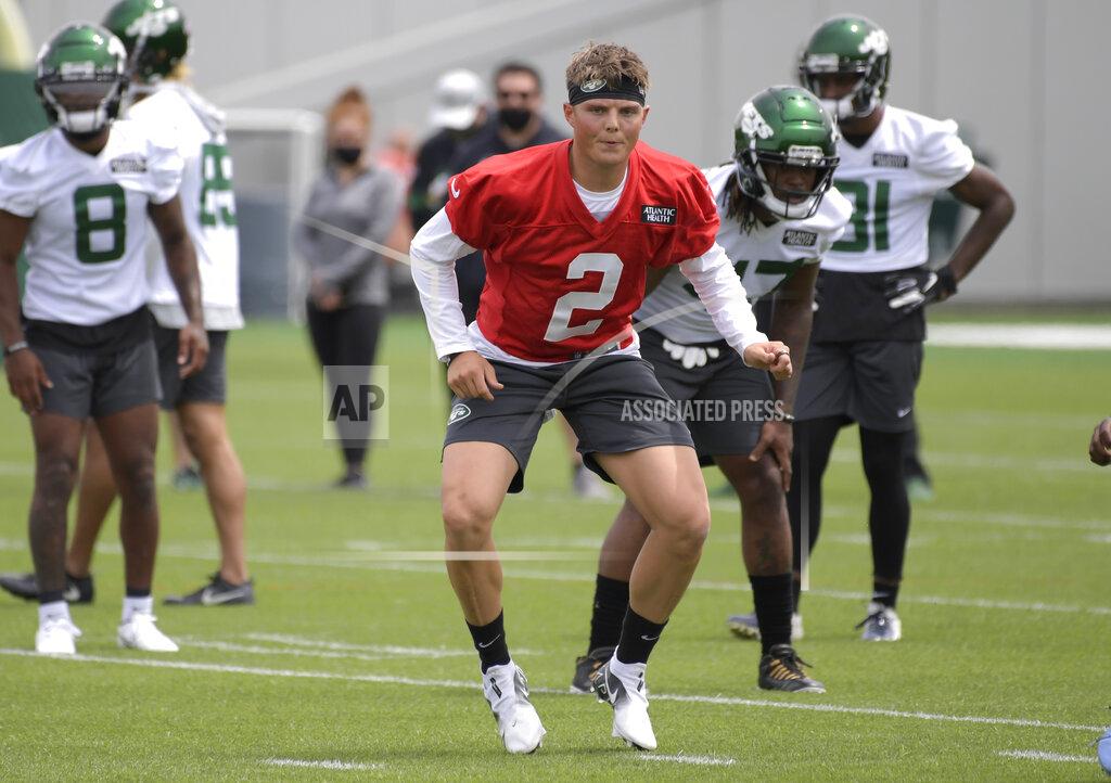 Bill Kostroun New York Jets first round draft pick Zach Wilson works out during NFL football rookie camp, Friday, May 7, 2021, in Florham Park, N.J.(AP Photo/Bill Kostroun)