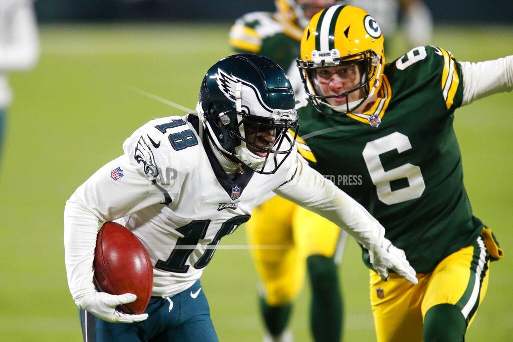 Matt Ludtke Philadelphia Eagles' Jalen Reagor gets past Green Bay Packers punter J.K. Scott for a touchdown on a punt return during the second half of an NFL football game Sunday, Dec. 6, 2020, in Green Bay, Wis. (AP Photo/Matt Ludtke)