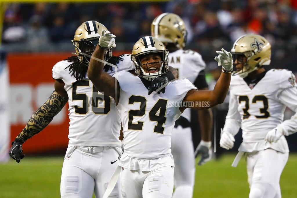 Charles Rex Arbogast New Orleans Saints strong safety Vonn Bell (24) celebrates a sack with outside linebacker Demario Davis (56) during the second half of an NFL football game against the Chicago Bears in Chicago, Sunday, Oct. 20, 2019. (AP Photo/Charles Rex Arbogast)