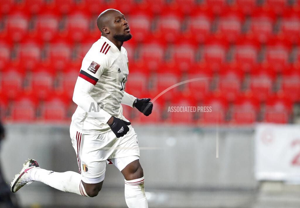 Petr David Josek Belgium's Romelu Lukaku celebrates after scoring his side's first goal during the World Cup 2022 group E qualifying soccer match between Czech Republic and Belgium at the Sinobo stadium in Prague, Czech Republic, Saturday, March 27, 2021. (AP Photo/Petr David Josek)