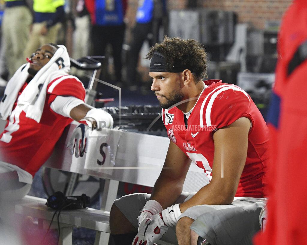 Thomas Graning Mississippi quarterback Matt Corral sits on the bench during the final minutes of the team's NCAA college football game against Texas A&M in Oxford, Miss., Saturday, Oct. 19, 2019. Texas A&M won 24-17. (AP Photo/Thomas Graning)