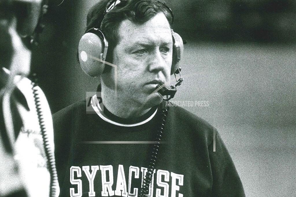 In this November 1980 photo, Syracuse University football coach Frank Maloney is shown. Former Syracuse University head football coach Frank Maloney, who succeeded the winningest coach in school history when the program was in decline, has died. He was 79. Maloney died Monday, March 30, 2020, at his home in Chicago, his family confirmed to the university. The cause was metastic brain cancer, according to Syracuse.com. (John Berry/The Post-Standard via AP)