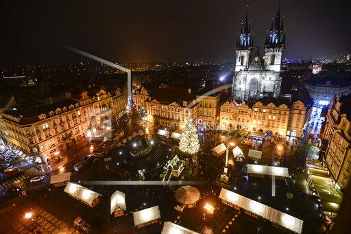 A general view of a Christmas market in Old Town Square in Prague, Czech Republic, Friday, Nov. 26, 2021. Due to the high rise in COVID-19 infections, Czech government banned Christmas markets in the whole country as of the evening of Friday Nov. 26, 2021. (Roman Vondrous/CTK via AP)