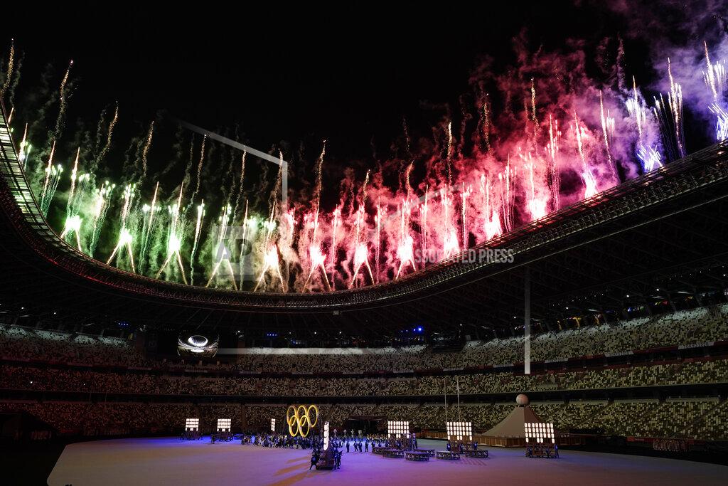 Ashley Landis Fireworks explode from the roof of the stadium as the Olympic rings are assembled during the opening ceremony in the Olympic Stadium at the 2020 Summer Olympics, Friday, July 23, 2021, in Tokyo, Japan. (AP Photo/Ashley Landis)