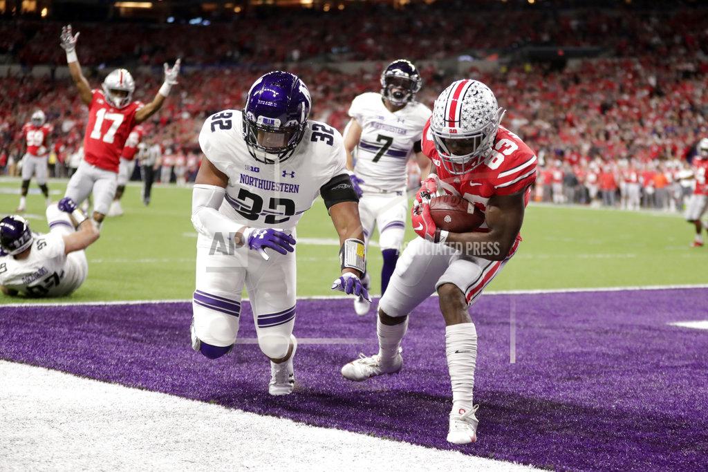 Michael Conroy Ohio State's Terry McLaurin (83) makes a touchdown reception against Northwestern's Nate Hall (32) during the first half of the Big Ten championship NCAA college football game, Saturday, Dec. 1, 2018, in Indianapolis. (AP Photo/Michael Conroy)