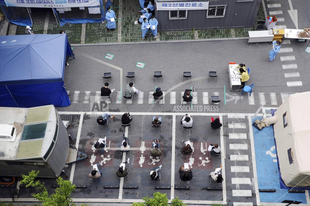 Choi Jae-Gu People wait to take a test for coronavirus at a testing facility of health center in Seoul, South Korea, Tuesday, May 12, 2020. As South Korea grapples with a new spike in coronavirus infections thought to be linked to nightspots in Seoul, including several popular with gay men, it's also seeing rising homophobia that's making it difficult for sexual minorities to come forward for diagnostic tests. (Choi Jae-gu/Yonhap via AP)