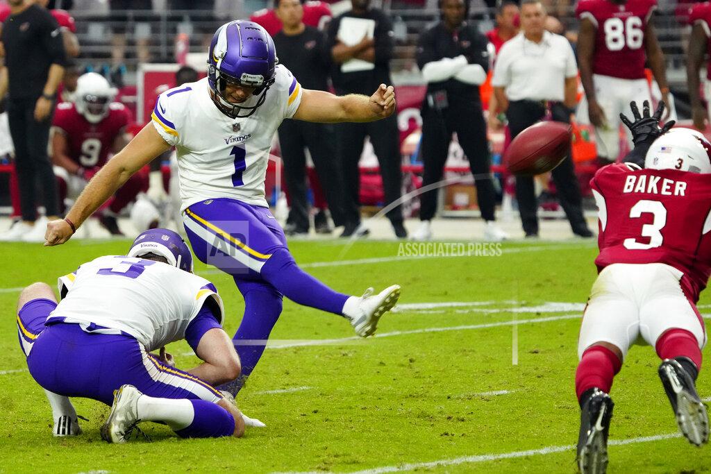 Minnesota Vikings kicker Greg Joseph (1) attempts a game-winning field goal as punter Jordan Berry (3) holds during the second half of an NFL football game, Sunday, Sept. 19, 2021, in Glendale, Ariz. Joseph missed and the Cardinals won 34-33. (AP Photo/Rick Scuteri)