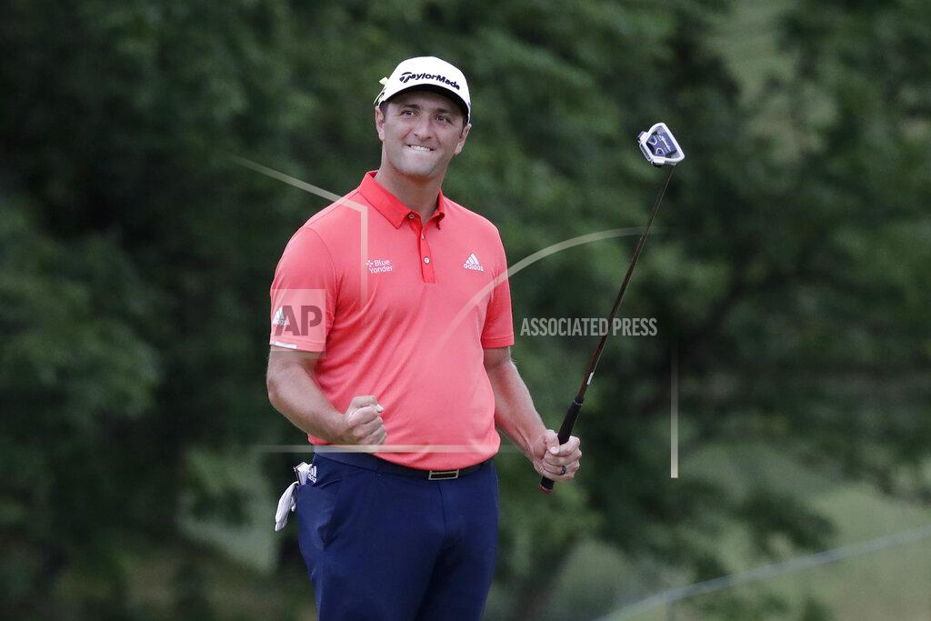 Darron Cummings Jon Rahm, of Spain, celebrates after the 18th hole to win the Memorial golf tournament, Sunday, July 19, 2020, in Dublin, Ohio. (AP Photo/Darron Cummings)