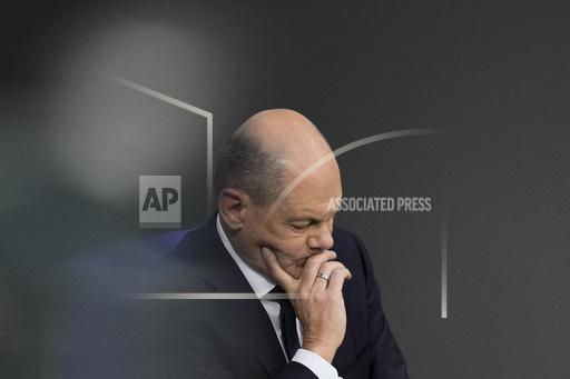 FILE - German Chancellor Olaf Scholz attends a debate fter his speech at the parliament Bundestag in Berlin, Germany, on Oct. 19, 2023. Chancellor Olaf Scholz says Germany needs to start deporting &ldquo;on a large scale&rdquo; migrants who don&rsquo;t have the right to stay in the country, adding to increasingly tough talk on migration since his coalition performed badly in two state elections earlier this month. Scholz&rsquo;s comments were published Friday, Oct. 20, 2021, as a leading German opposition figure called for the center-left chancellor to dump his quarrelsome coalition partners and instead form a government with conservatives to deal with migration issues. (AP Photo/Markus Schreiber)