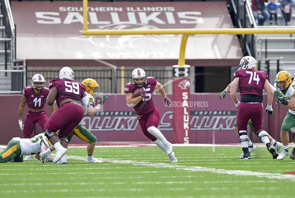 Byron Hetzler Southern Illinois running back Javon Williams Jr. (15) finds a hole in the North Dakota State defense during the second quarter of an NCAA college football game Saturday, Feb. 29, 2021, in Carbondale, Ill. (Byron Hetzler/The Southern Illinoisan via AP)