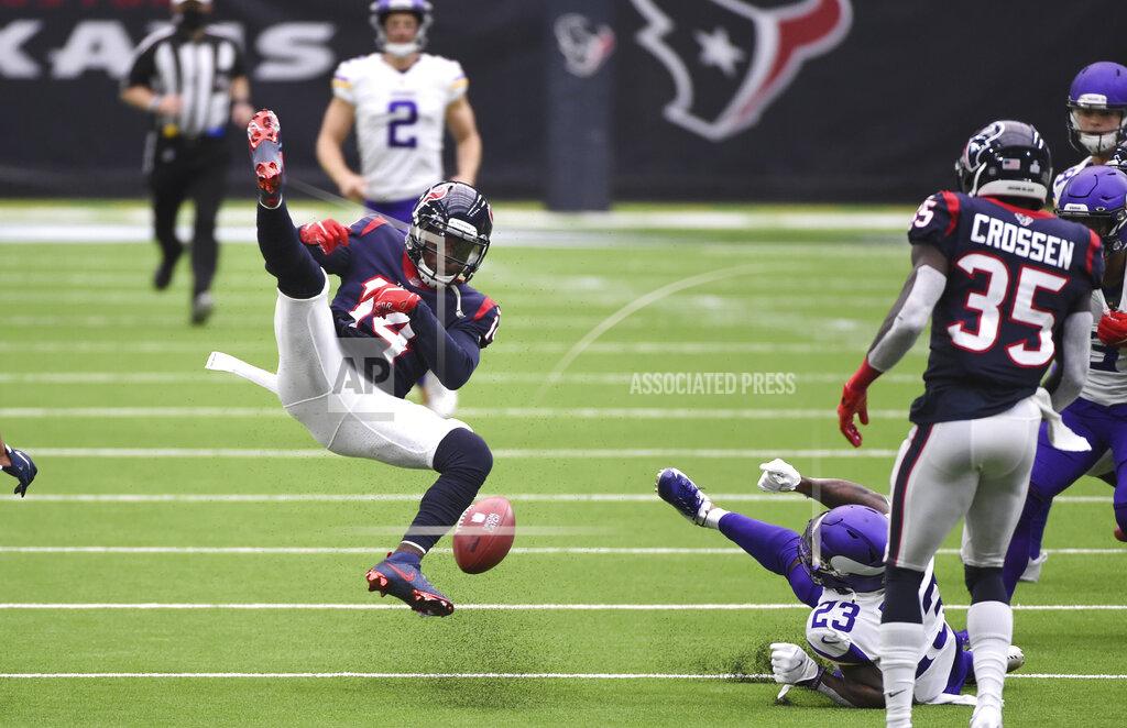 Eric Christian Smith Houston Texans wide receiver DeAndre Carter (14) fumbles on a punt return during the first half of an NFL football game against the Minnesota Vikings, Sunday, Oct. 4, 2020, in Houston. Minnesota recovered the ball. (AP Photo/Eric Christian Smith)