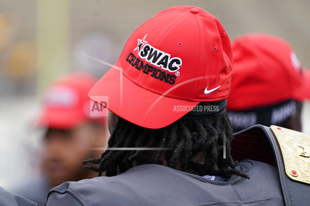 Rogelio V. Solis An Alabama A&M football player sports the winner's baseball cap following the team's 40-33 win over Arkansas-Pine Bluff in the Southwestern Athletic Conference championship NCAA college football game Saturday, May 1, 2021, in Jackson, Miss. (AP Photo/Rogelio V. Solis)