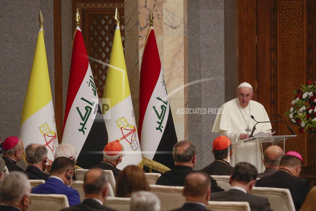 Andrew Medichini Pope Francis delivers his speech at Baghdad's Presidential Palace, Iraq, Friday, March 5, 2021. Pope Francis has arrived in Iraq to urge the country's dwindling number of Christians to stay put and help rebuild the country after years of war and persecution, brushing aside the coronavirus pandemic and security concerns. (AP Photo/Andrew Medichini)