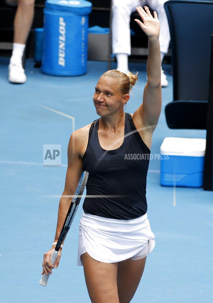 Rick Rycroft Estonia's Kaia Kanepi waves after defeating United States' Sofia Kenin in their second round match at the Australian Open tennis championship in Melbourne, Australia, Thursday, Feb. 11, 2021.(AP Photo/Rick Rycroft)