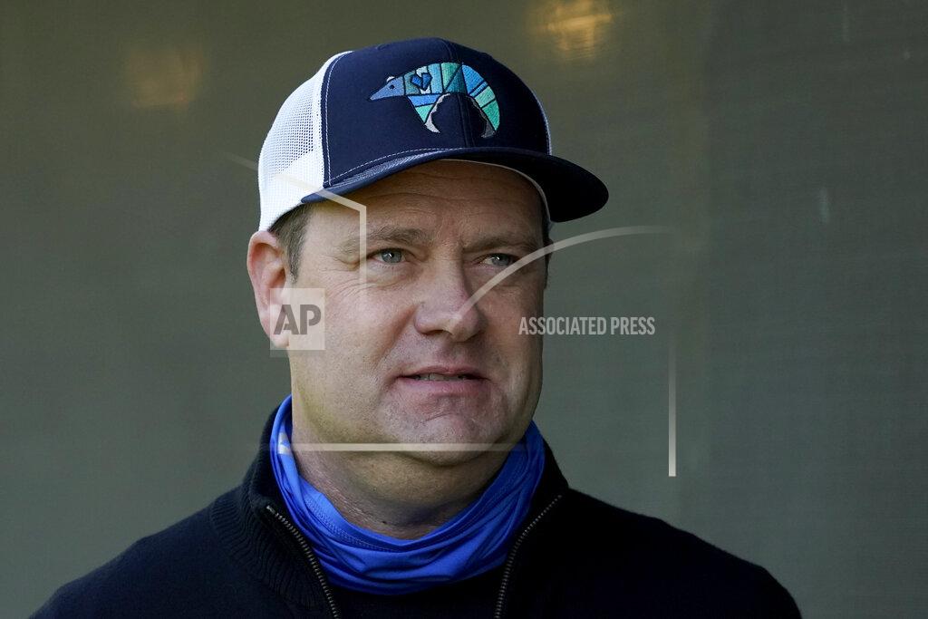 Charlie Riedel Trainer Doug O'Neill talks to a reporter outside his barn after a workout at Churchill Downs Tuesday, April 27, 2021, in Louisville, Ky. The 147th running of the Kentucky Derby is scheduled for Saturday, May 1. (AP Photo/Charlie Riedel)