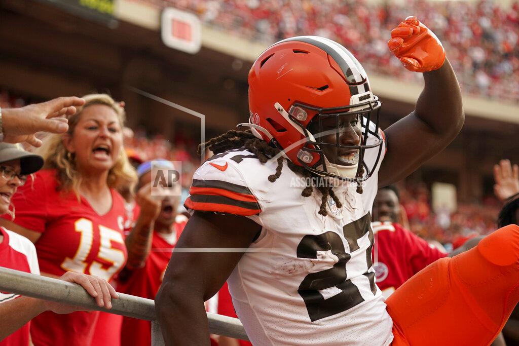Cleveland Browns running back Kareem Hunt celebrates after scoring during the second half of an NFL football game against the Kansas City Chiefs Sunday, Sept. 12, 2021, in Kansas City, Mo. (AP Photo/Charlie Riedel)